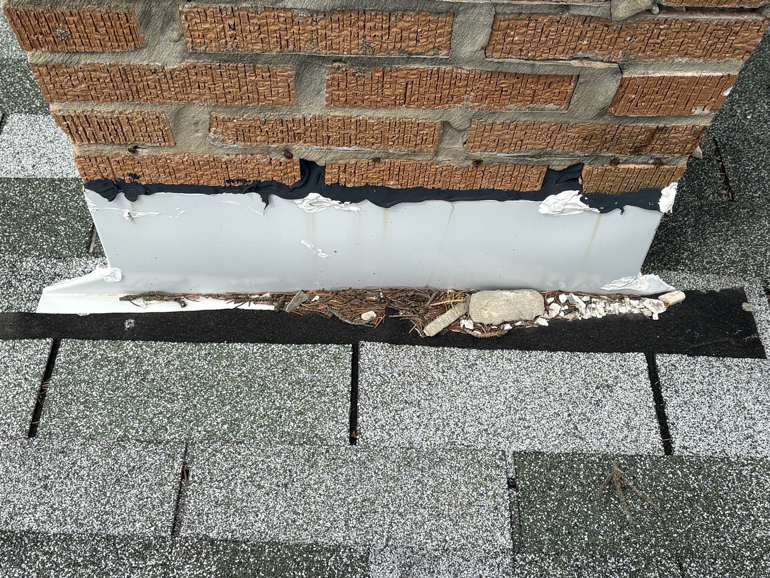 Poor chimney flashing and roof repair example